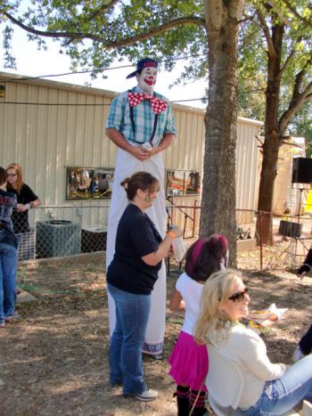 clown on stilts