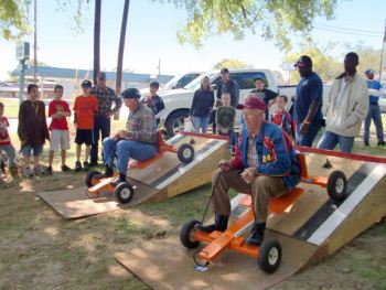 Two men on go-carts