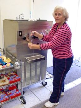 lady at an ice-cream machine