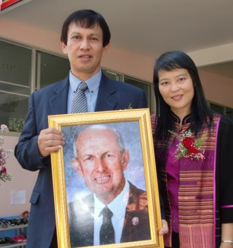Chugait and Fong with portrait of Herman L. Hoeh.