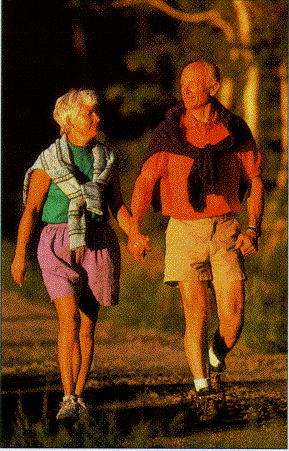 an elderly couple taking a walk
