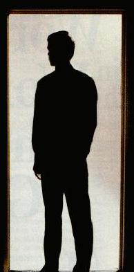 silhouette of man in doorway