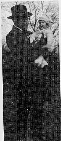 Armstrong in Chicago in 1919 with daughter Beverly, the first of four children