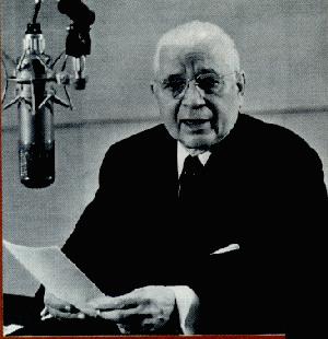 Herbert Armstrong at a microphone